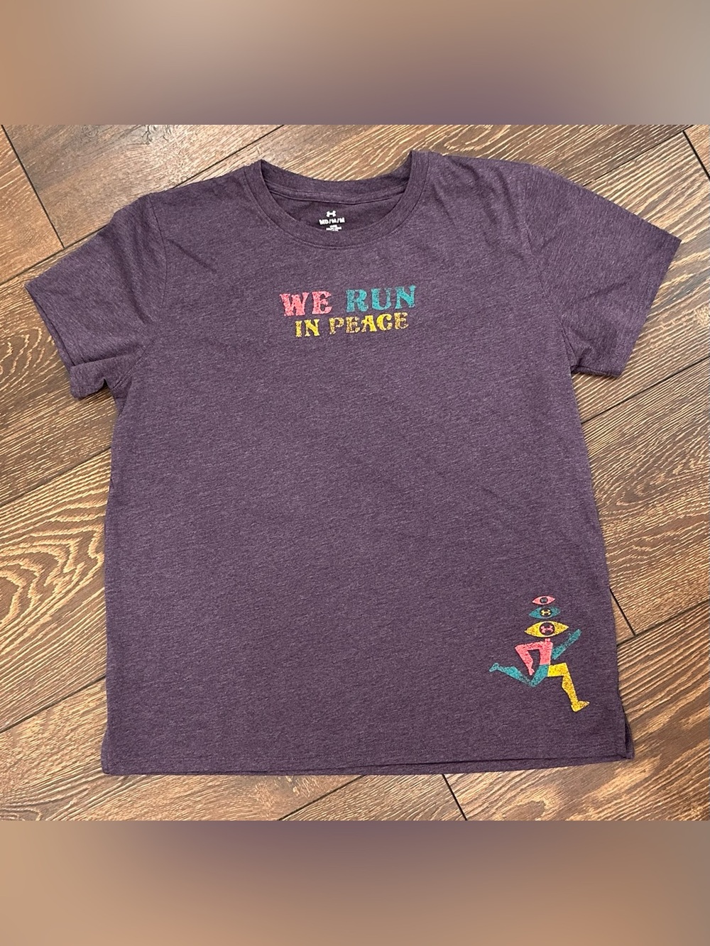 Under Armour Women’s Purple 'We Run In Peace' Graphic Short Sleeve Tee